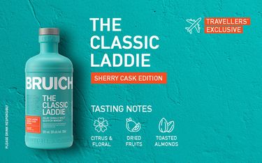 Promotional poster for "The Classic Laddie Sherry Cask Edition" whisky by Bruichladdich. The turquoise bottle features tasting notes: "Citrus & Floral," "Dried Fruits," and "Toasted Almonds." It highlights "Travellers' Exclusive".