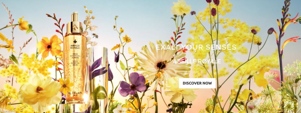  The image is an advertisement for Guerlain's Abeille Royale line featuring a serum.