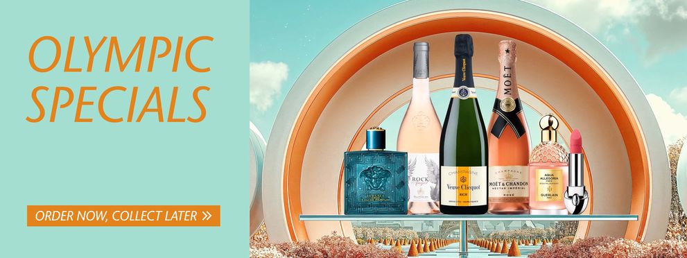 A promotional banner with a turquoise background showcasing 'Olympic Specials.' The banner features a selection of luxury products, including Versace Eros perfume, a bottle of Rock Angel rosé wine, Veuve Clicquot champagne, Moët & Chandon champagne, Guerl
