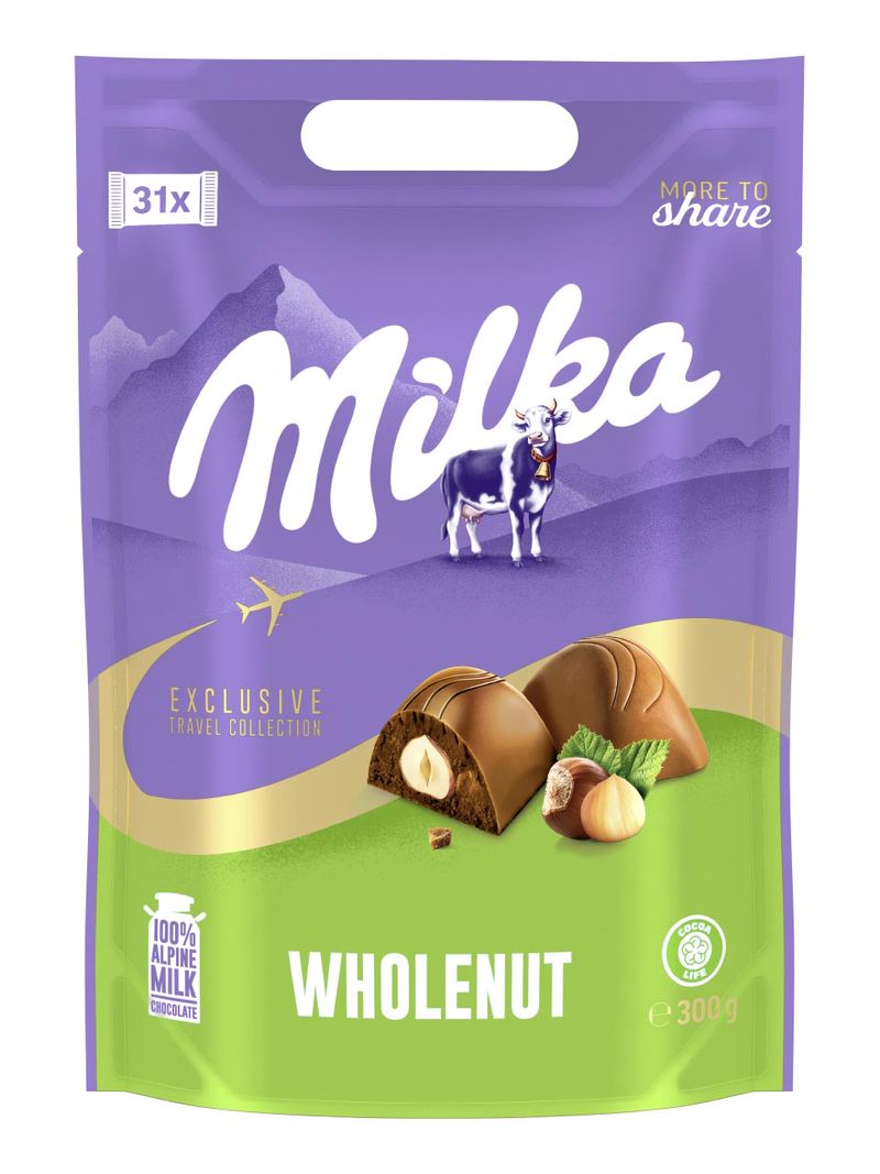 Alpenmilch Schokolade mit ganzen Haselnüssen 300g.